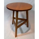 A pair of late 20th century craftsman made oak cricket tables, raised on plain supports and