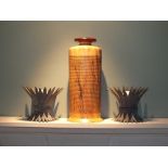 A modern treen cylindrical narrow neck vase, 40cm high, together with a pair of patinated pestle