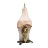 A brass Buddha head table lamp with silk pagoda niche shade, 1.05m high overall illustrated