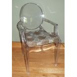 A set of eight Phillipe Starck designed Victoria Ghost perspex dining chairs by Kartell, including