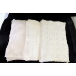 Three sets of Lefkara lace, crochet and needlework placemats, in cream and white