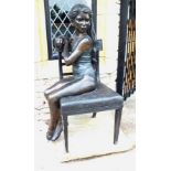 Desmond Fountain (b.1946) A life size partial gilt bronze of a girl with long hair, seated upon a