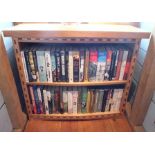 A late 20th century bespoke oak bookcase, fitted one bow front adjustable shelf and base, the