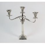 A three branch silver candelabrum, Alexander Smith, Birmingham 1963, designed as a fluted Corinthian