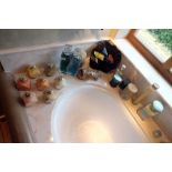 A "Colin Andrews" stoneware fish, various bathroom requisites, jars of salts, a shaving mirror on