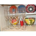 Eight Dartington glass champagne flutes, two Dartington brandy bowls, six wine goblets together with