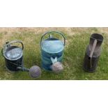 Three vintage watering cans