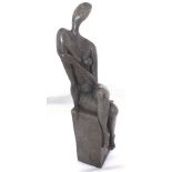 Helen Sinclair "Reverie" a carved reconstituted soapstone sculpture of a seated nude female, on