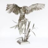 Alf Norman A 20th century steel sculpture of a Macaw, wings outstretched, raised on bamboo effect