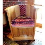 A pair of craftsman made oak low back sedile chairs of Medieval design, panelled construction with