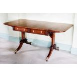 A Regency rosewood sofa table, the rectangular top with rounded corners, banded in coromandel,