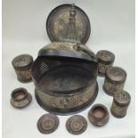 A late 19th century Betel nut kit, antiqued brass construction with pierced and chased decoration,