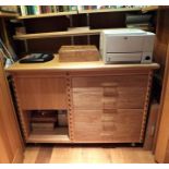 A contemporary bespoke oak office unit, fitted four drawers with brass handles and built in "