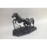 AFTER RUDOLF KAESBACH (1873-1950) An animalier bronze statue of deerhounds, one standing and one