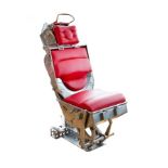 A "Vampire" jet fighter ejection seat, polished aluminium with red leather seat, back and head pads,