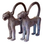 A large pair of decorative West African Benin style bronze Leopards - cast in sections with