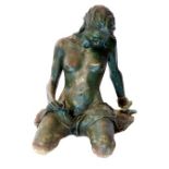 A 20th century bronze of a young woman, semi naked draped with fabric, kneeling, 45cm high (