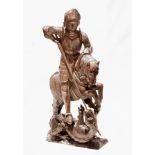 A 16th century wood carving "St George and The Dragon", polychrome painted and partial gilt. St