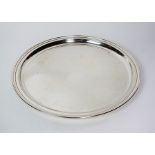 A Tiffany & Co sterling silver tray, of plain polished circular form, stamped to the reverse ‘