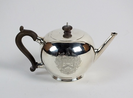 A silver Britannia standard bullet shaped teapot, L.A. Crichton, London 1923, of plain polished form