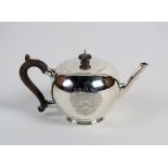 A silver Britannia standard bullet shaped teapot, L.A. Crichton, London 1923, of plain polished form