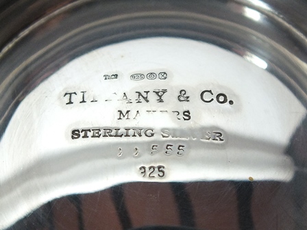 A Tiffany & Co sterling silver cream jug, of plain polished baluster form with scroll handle, - Image 2 of 2