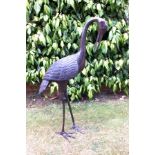 A 20th century bronze crane, modelled stooping