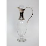 A silver mounted glass claret jug, Mappin & Webb, Sheffield 2001, the glass of baluster form with