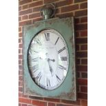 A late 20th century reproduction wall clock, in weathered green painted metal frame with simulated