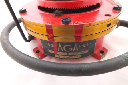 An "Aga" jet, brass construction, partially painted in red, bears manufacturers label, 20cm high - Image 3 of 3