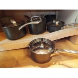 A set of Infinite Circulon steel based pans, a Wok and other cookware