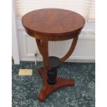 A 20th century figured walnut veneered occasional table of Biedermeier design, the circular top