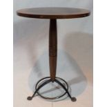 A contemporary "Michael Reed design" pedestal wine table, having burr veneer top, on ring turned