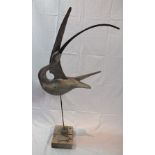 GUY TAPLIN (b.1939) "Up-winged Curlew" a carved and painted driftwood sculpture mounted on metal