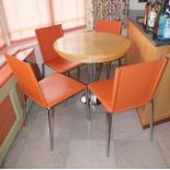 A modernist Italian made designer kitchen set, comprising beech topped circular table, supported