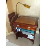 A modern mahogany effect kneehole computer desk, along with a gilt metal lamp standard and a folding