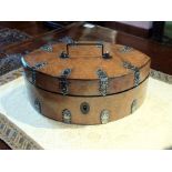 A Regency burr elm lozenge shape work box, ebony strung with cut steel mounts, angular sling handle,