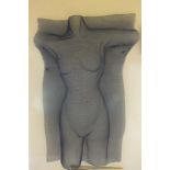 A moulded wire mesh sculpture in the form of a female torso, 38cm x 25cm