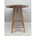 A contemporary occasional table with twisted rope laid top, on four supports with stretchers, 62cm