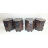 Four Oriental stained pine octagonal boxes, hinged covers with wrought iron strap mounts and