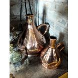 A 19th century four gallon copper measure of pear shape with cylindrical neck, flared base rim