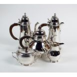 A Tiffany & Co George I style five piece silver tea and coffee service, London 1969, comprising: a