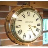 S. SMITH AND SON LTD. A late 19th century brass framed ship's clock by "S.Smith and Son Ltd., 6