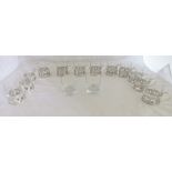 A set of twelve silver plated glass holders and fourteen tumblers inscribed; 'The Old Manor 1991'