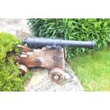 A pair of George III English bronze barrelled cannons, circa 1775, the barrels decorated with a