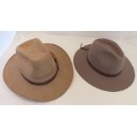 A Cambridge grey top hat size 7 1/4, and a Barmah Australian Panama hat, X large (2)