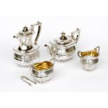 A four piece silver tea service, C S Harris & Sons, London 1925 & 1927, each piece of oval form with
