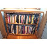 A late 20th century bespoke oak bookcase, fitted one bow front adjustable shelf and base, the