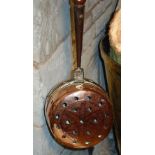 A rare 17th century copper plague pan of saucepan shape with pierced cover, the turned wood handle