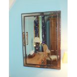 A modern rectangular bevelled and bordered wall mirror, 73cm wide, 103cm high